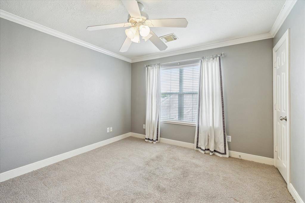 The third level has two secondary bedrooms with connecting bath and a private study which could serve as a fifth bedroom.