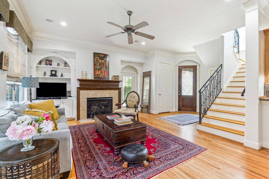The home features first floor living with a combined open living, dining, and kitchen areas.