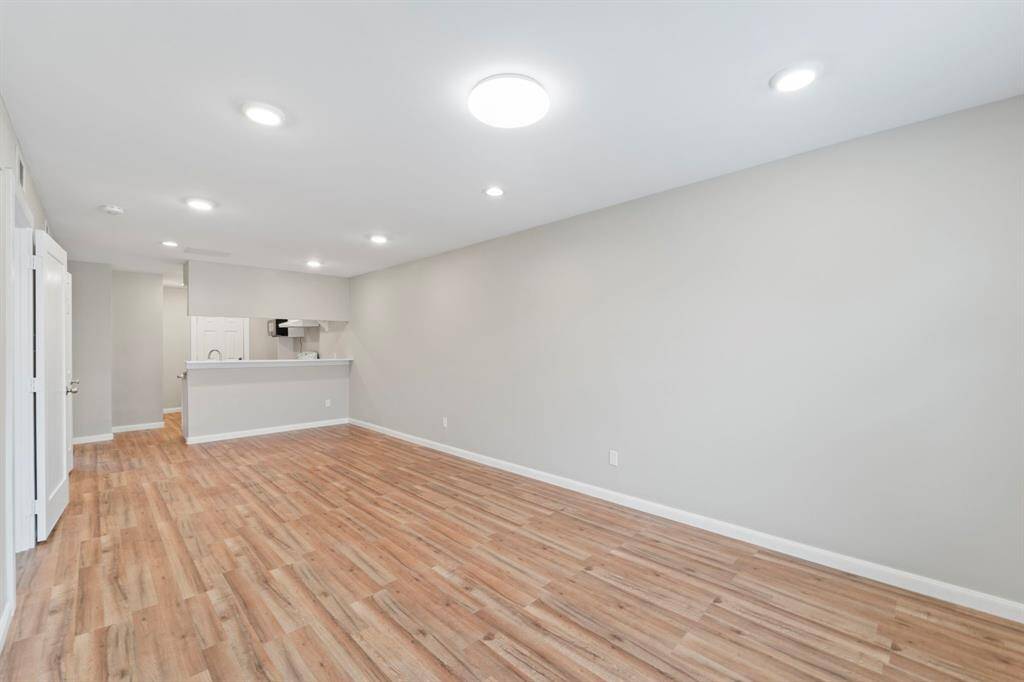 The interior has been recently UPGRADED with modern finishes, boasting sleek flooring throughout -- no carpet here!