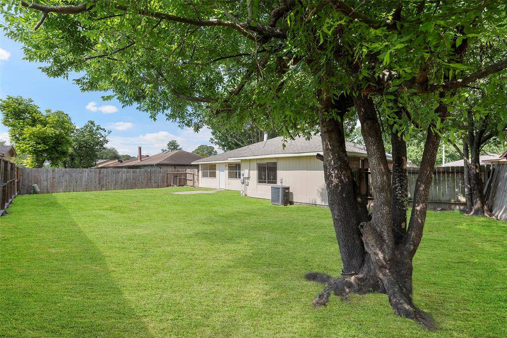 Mature trees offer shady spaces on this property!