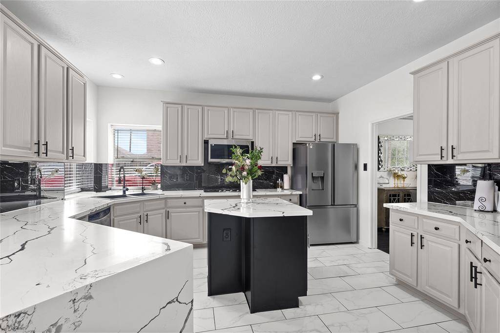 Kitchen a plethora of cabinets & counter space