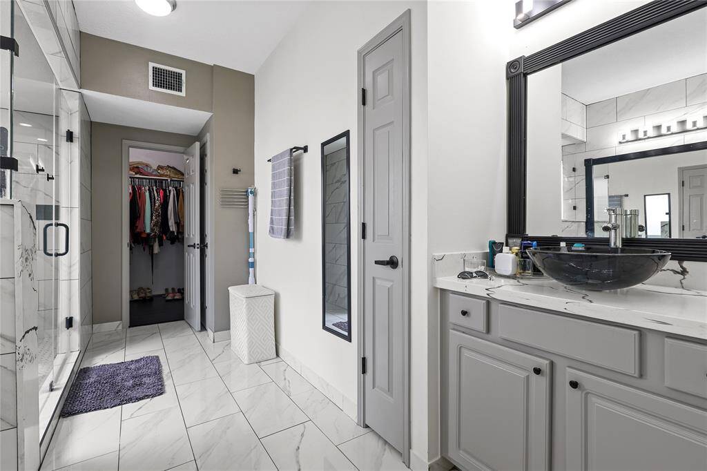 Primary Ensuite:  Another view of the other side of the Primary Ensuite with walk-in closet, separate his & her vanity
