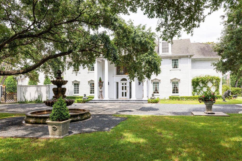 Relish in this southern colonial style residence, with a one of a kind location!
