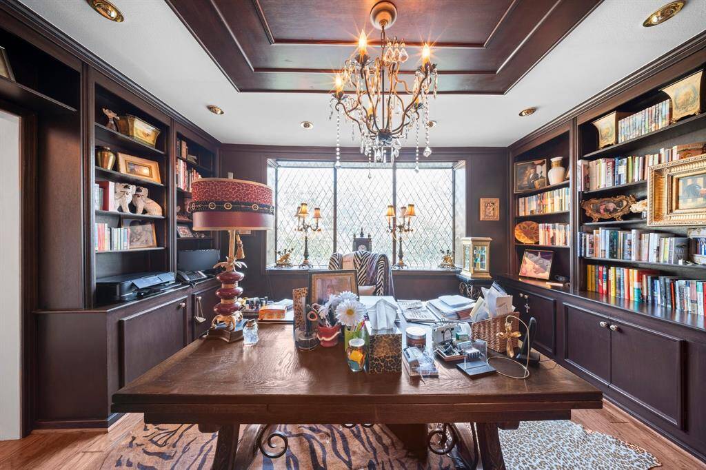 The home study has additional storage with built-in shelving