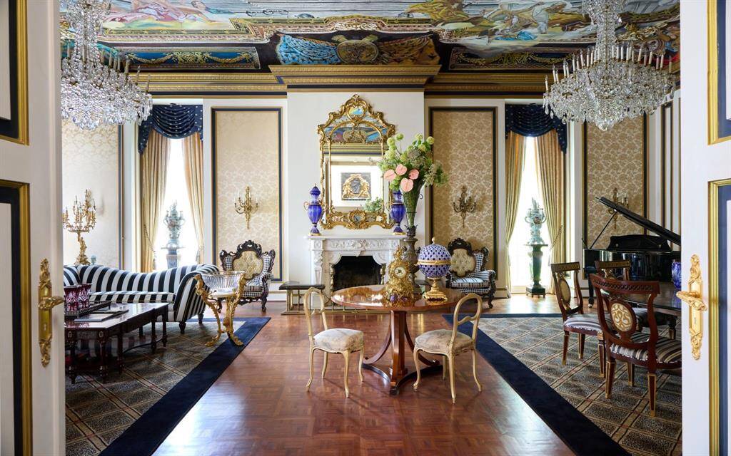 View of the spacious ballroom with floor to ceiling windows, flooded with natural light