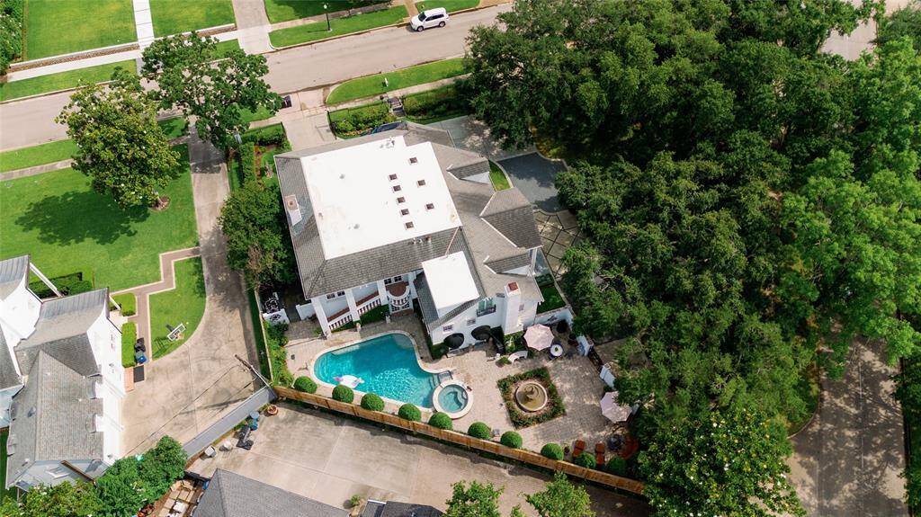 Perched on over 27,000 sqft with sweeping oak trees