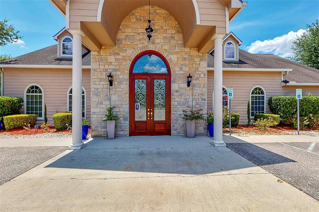 Stone Facade, French Doors & Porte Cochere