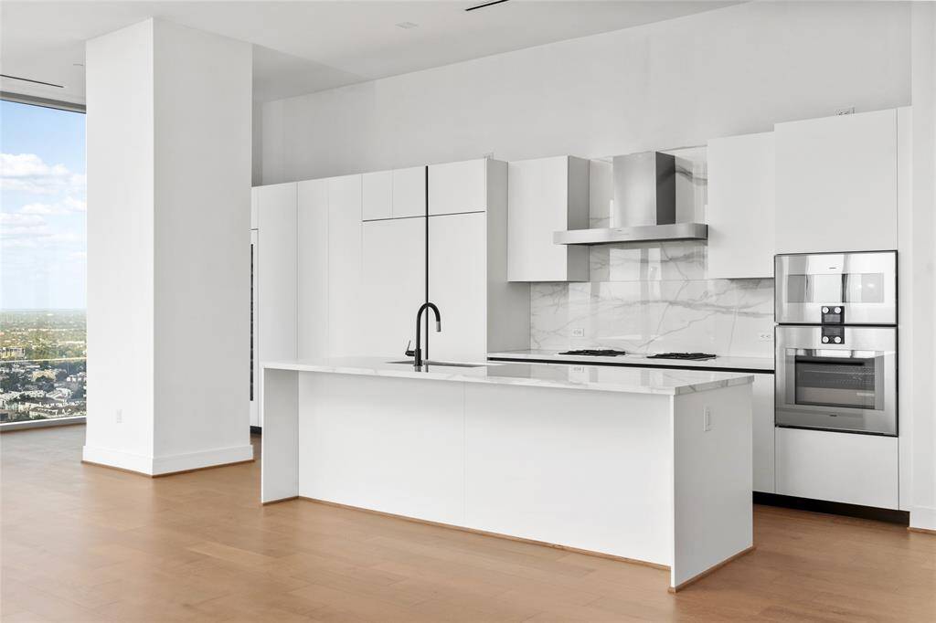 Upgrades include addtinal Pedini Italian Cabinetry, wine refigerator and Gaggenau Appliances.