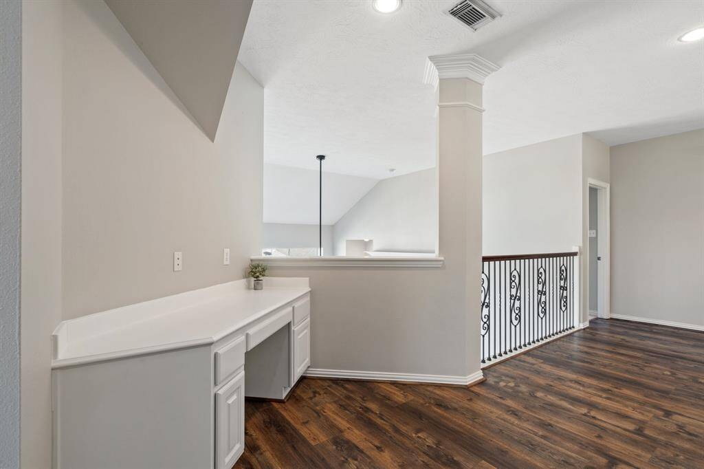 2nd floor landing area has a nice study/office nook.