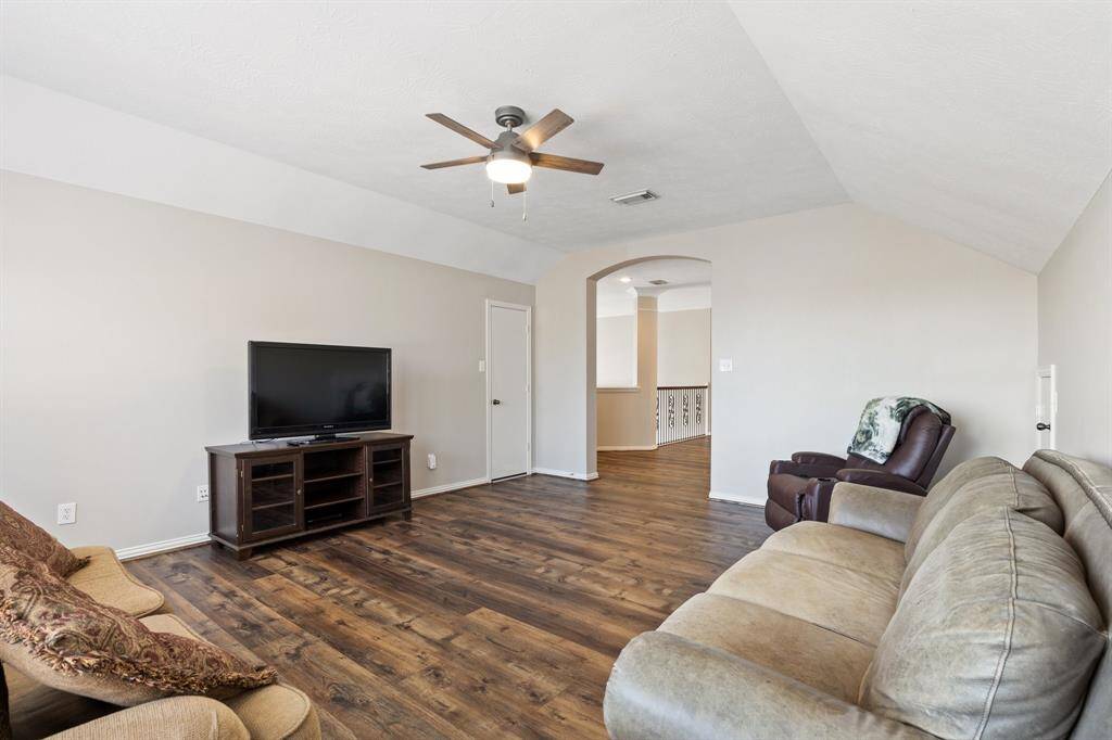 Off the landing area is the game room/ second living space.