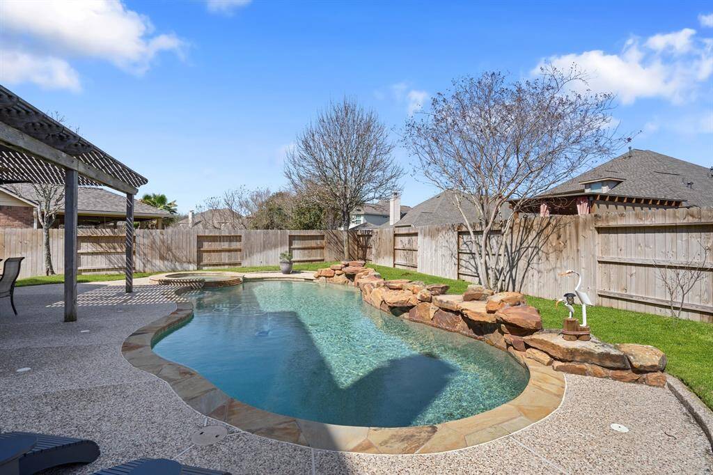 Heated pool and spa is perfect for your gatherings on those hot summer days in Houston.