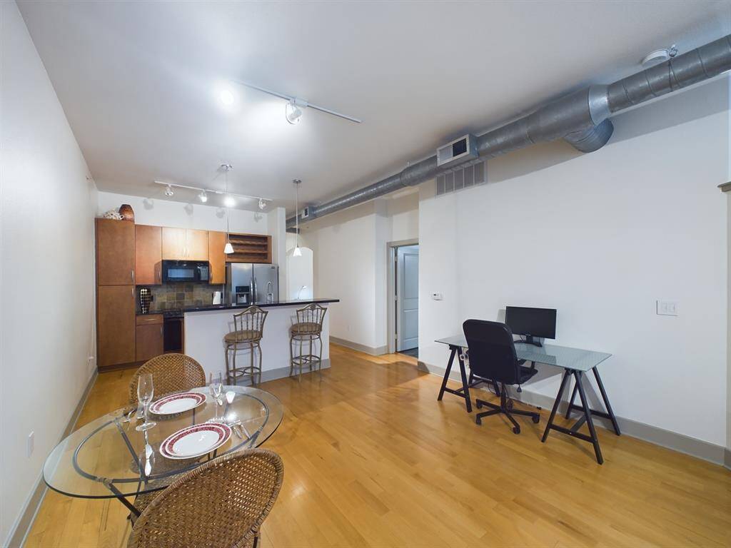 Dining Area Currently Split Between Dining & Workspace