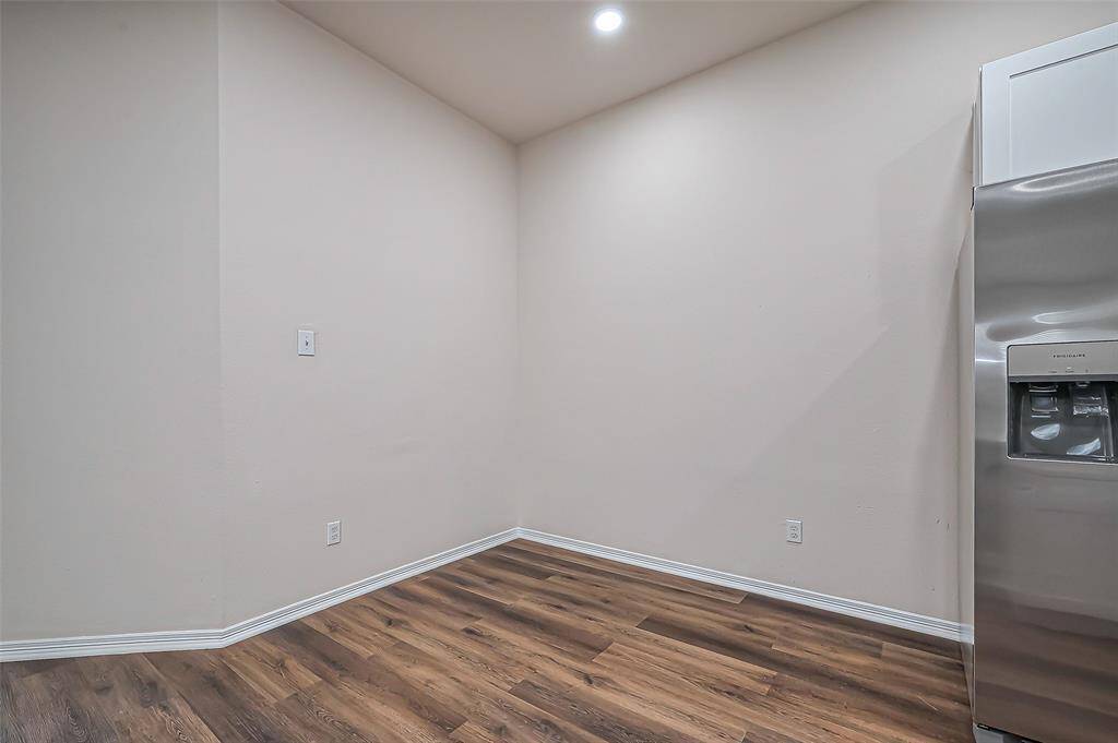 The breakfast area, measuring 9.4 x 8.5, is the perfect spot for casual dining just off the kitchen. With LVP flooring, cleanup is a breeze—especially after meals with little ones. This space offers both convenience and practicality for everyday living.