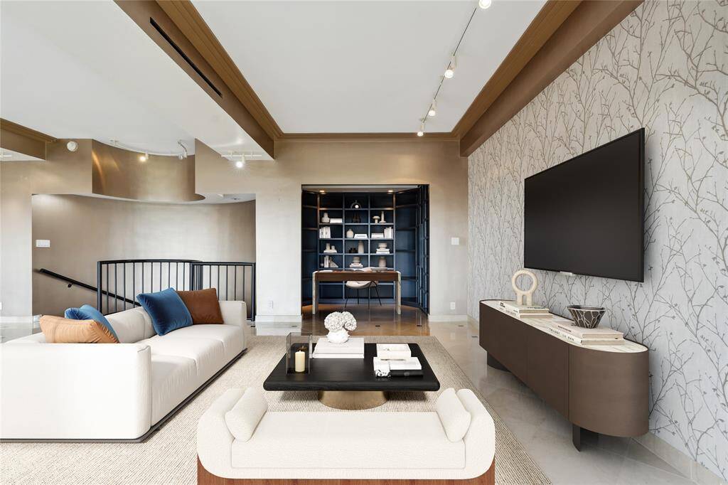 Cozy library alcove with built-in book shelves. Image shown virtually staged.