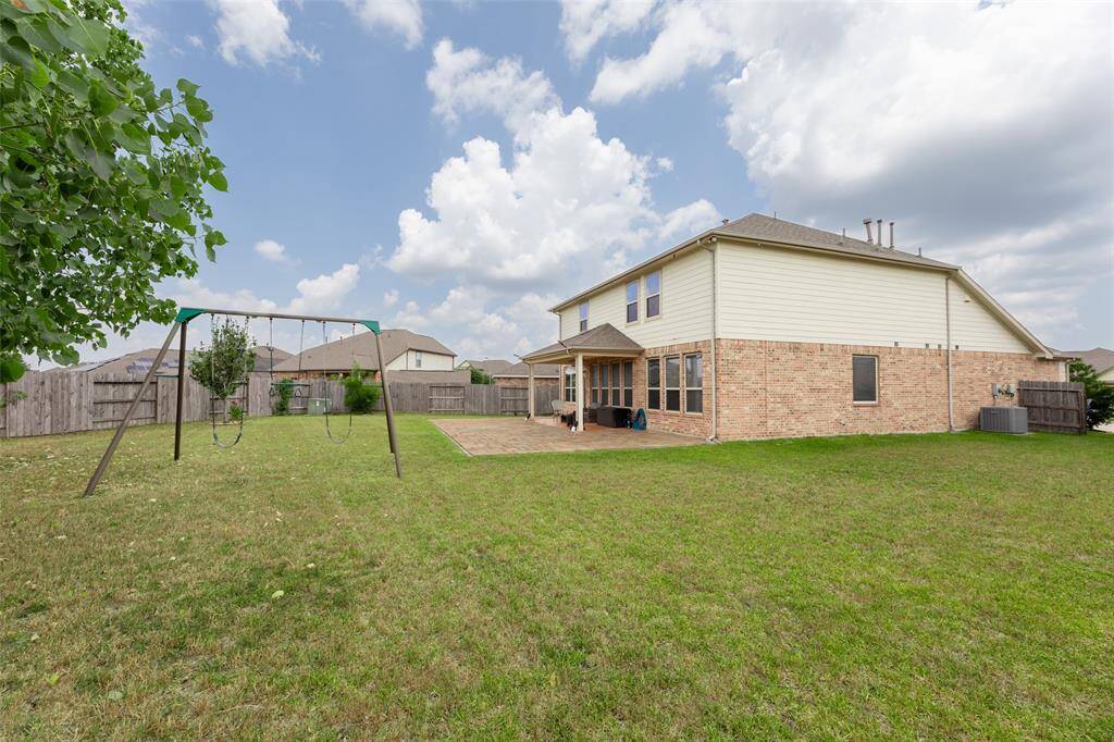 Inviting Entry with tile flooring and an archway leading into a spacious living area.