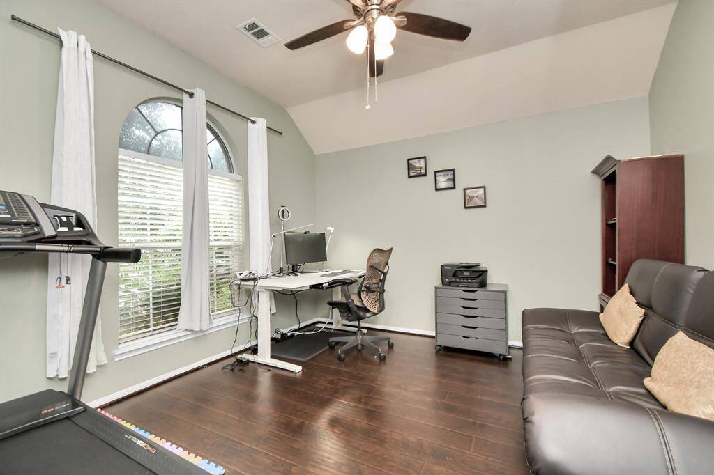 As you enter, you have big office or could be used as a mix use of space