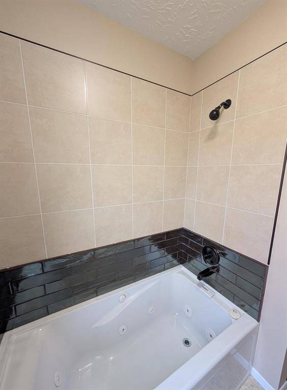 NEW Freshly tiled jetted tub
