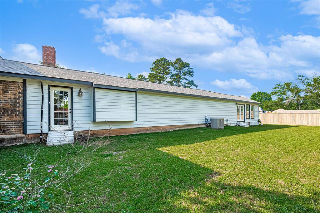 Plenty of fenced in yard space off the other side of the home.