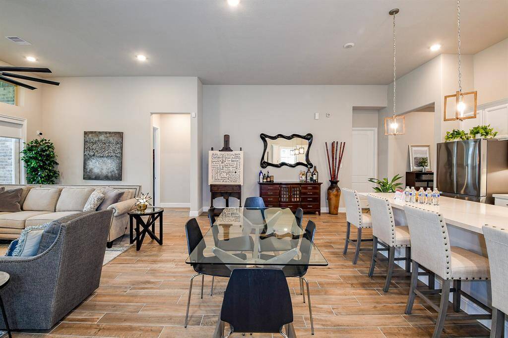 View of the dining room and breakfast bar that is open to living!