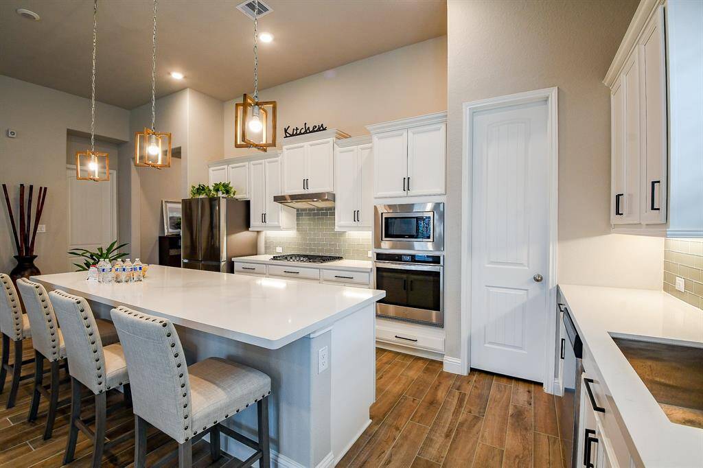 Love the storage in this beautiful kitchen. Tons of counter and cabinet space!