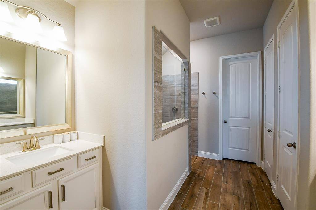 One of the master bath vanities with tons of storage!