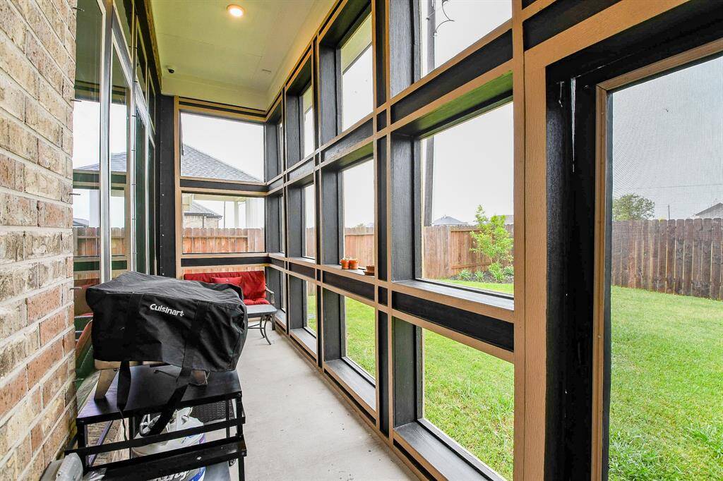 Wonderful back screened in patio! Enjoy mornings and/or evenings without pesty mosquitos!