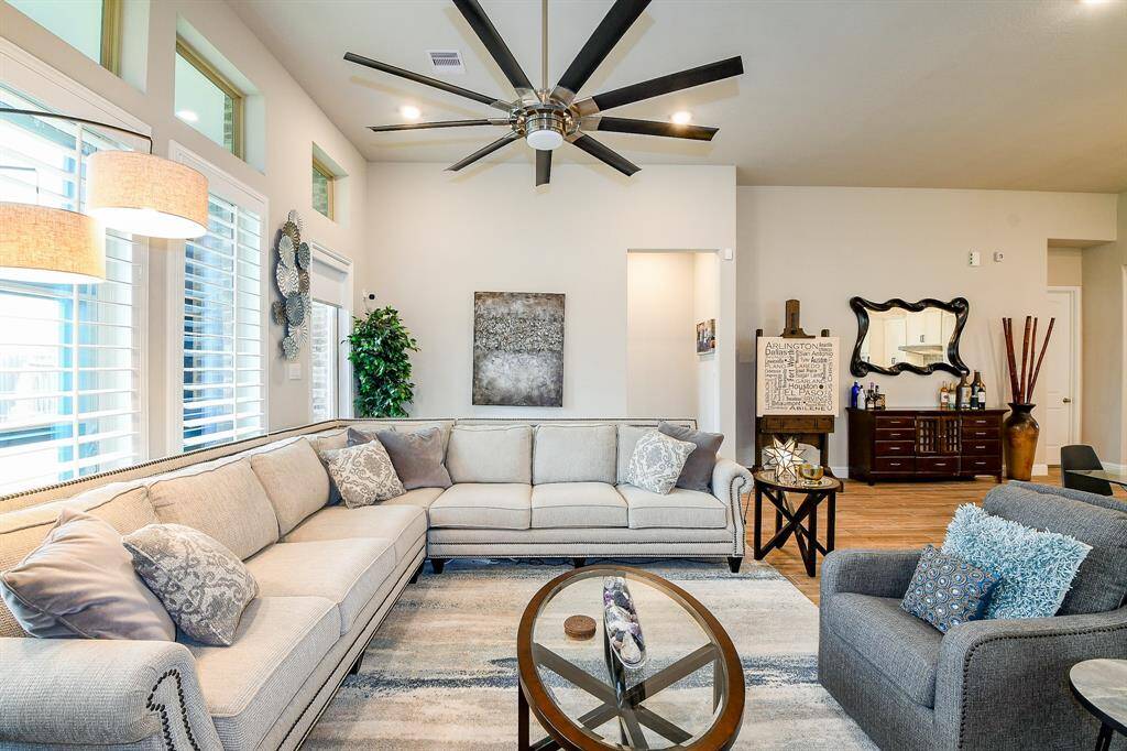 Check out the huge fan and lovely windows bringing in tons of light!