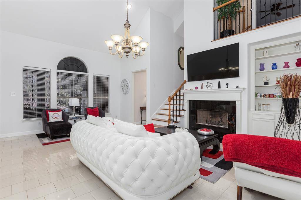 Spacious Family Room with Built-ins and Fireplace