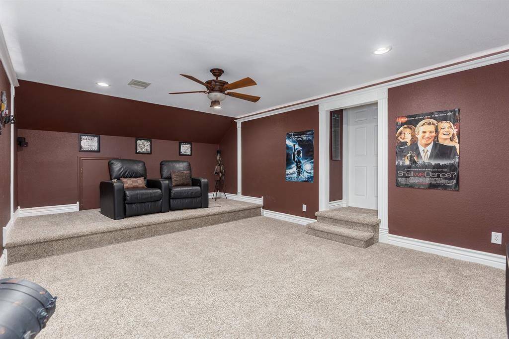 Upstairs Media Room With An Attached Full Bath