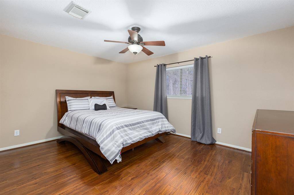 Upstairs Bedroom With Backyard View