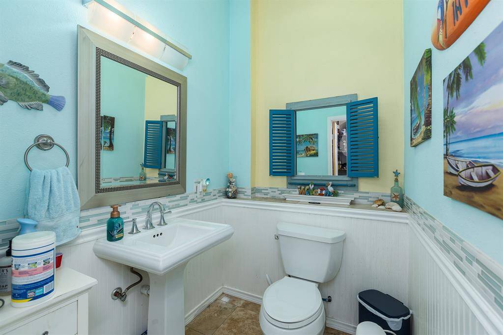 Garage Half Bath With Access To Backyard Pool