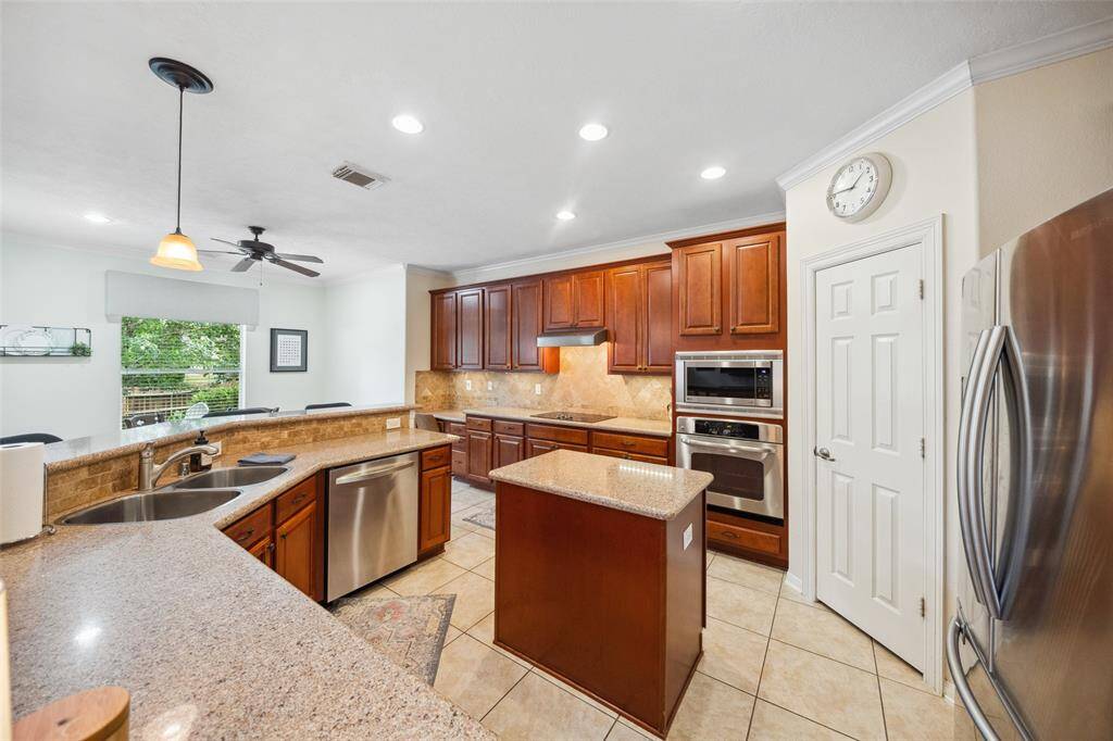 Lots of counters, lighting, and cabinets for entertaining or prepping