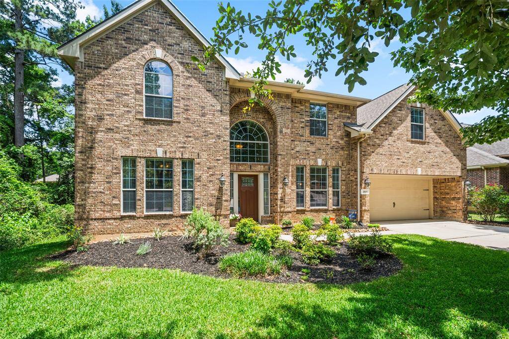 All brick home with large windows