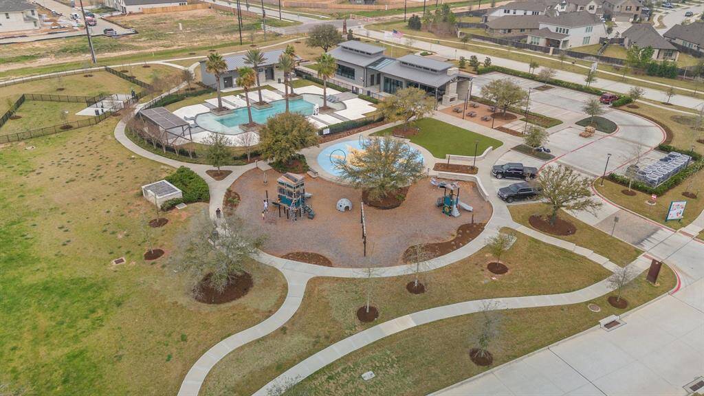 The community offers fantastic amenities including a refreshing community pool and a fun-filled playground, perfect for family enjoyment and relaxation!