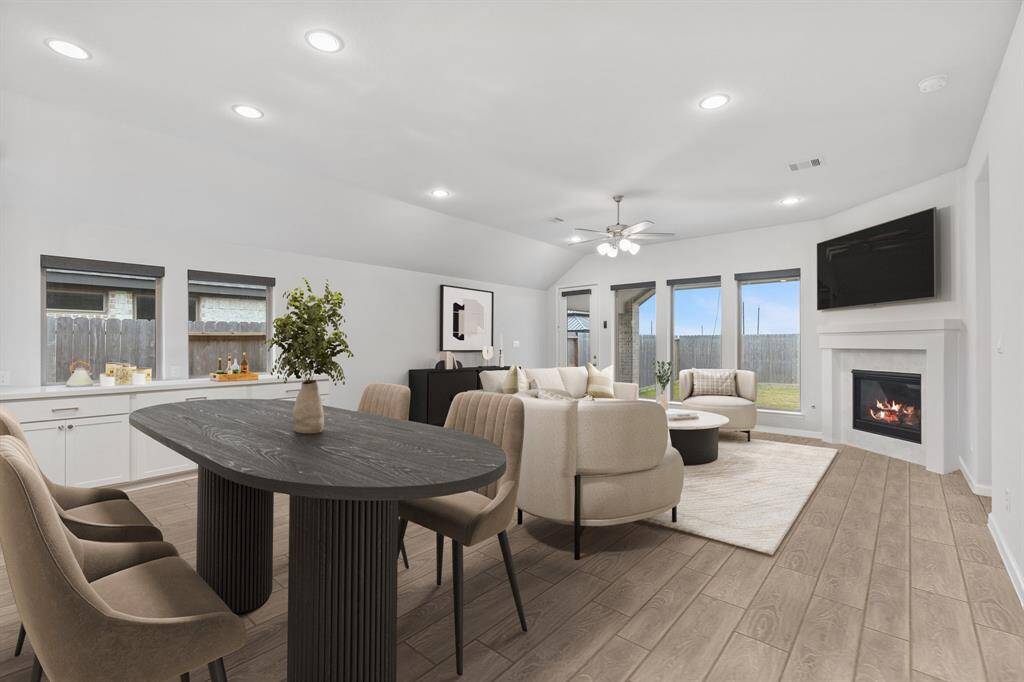 The breakfast area is perfectly situated between the living room and kitchen, offering tile flooring, recessed lighting, and extra cabinet space for added convenience and storage! *Virtually Staged*