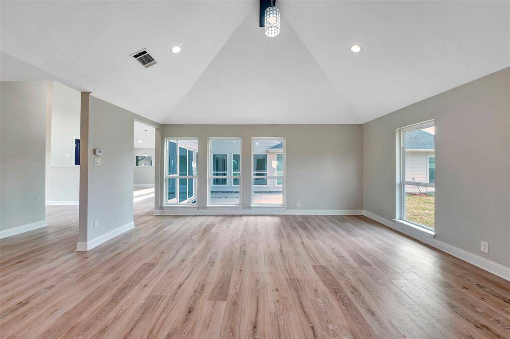Another view of the living room as it looks out over the back patio and the golf course.