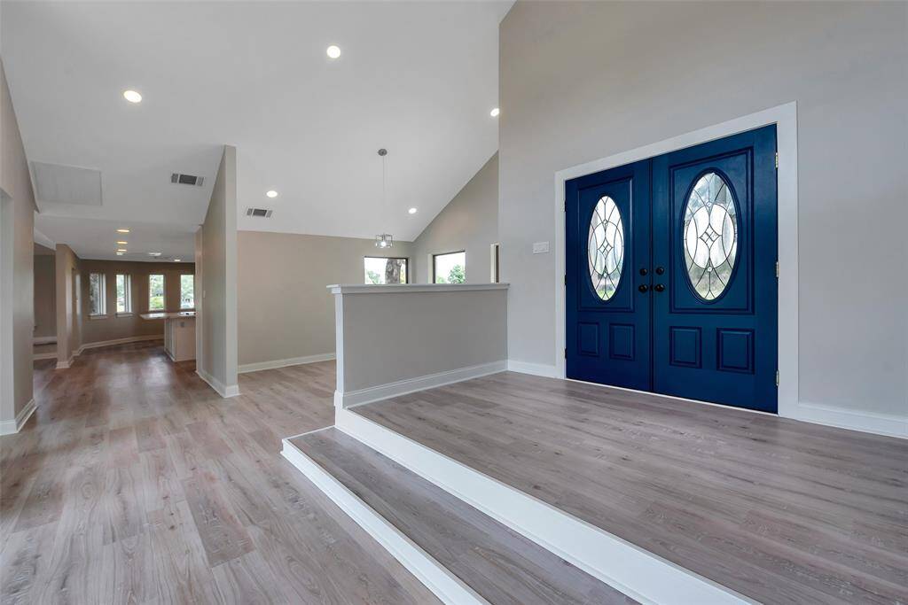 Recent exterior and interior paint throughout - 2024. The front doors are also new, installed 2024. Step inside and fall in love with the magnificent floor plan and bright, open living spaces! The waterproof luxury vinyl plank flooring in "Amber Oak" was also installed this year - 2024.