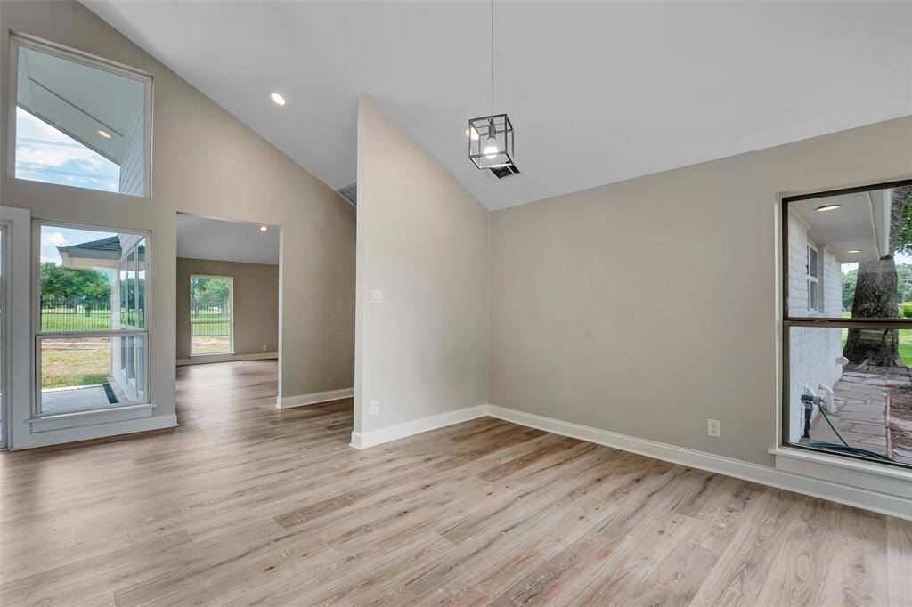 The dining room is unique in that it has views of the front yard and the rear with the peaceful golf course just beyond the wrought iron back fence.