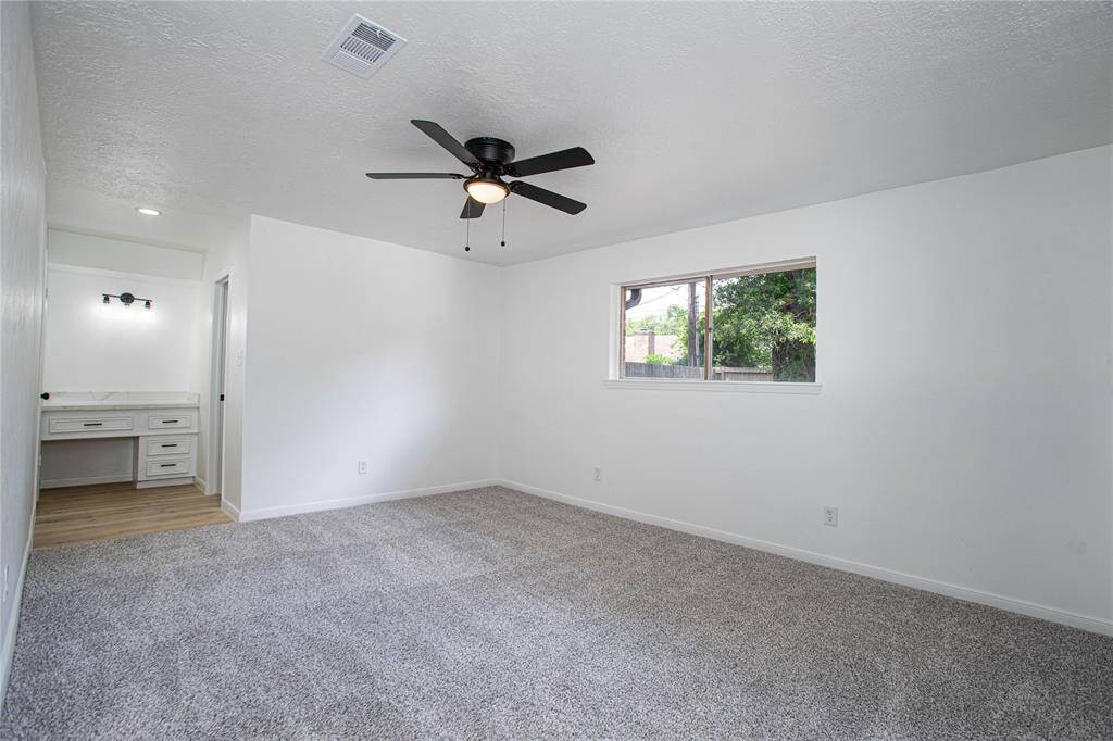 Primary bedroom that offers new carpet, hardware and plenty of space!