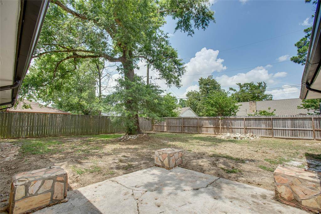 Backyard that offers a back patio thats perfect for hanging out with family, friends and making those unforgettable memories!