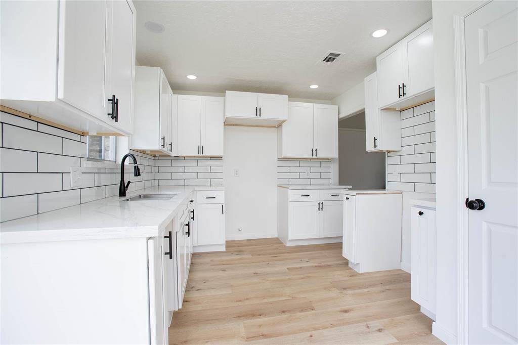 Another point of view of the fully remodeled kitchen.