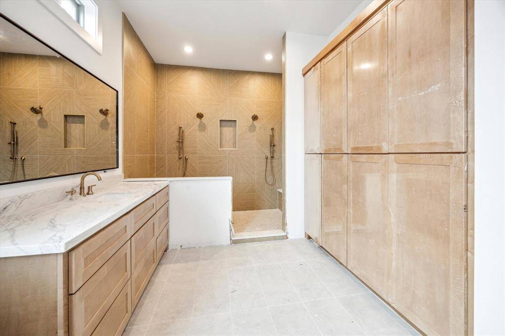 Welcome to 3018 Mid Lane! This 3-4 bedroom, 3.5 bathroom new construction home is situated on a 4,860 square foot lot near Highland Village.