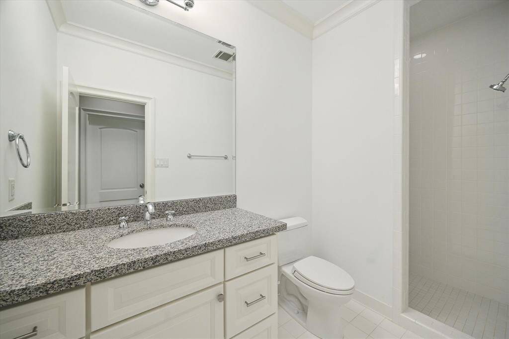 Third floor features a convenient full bathroom.