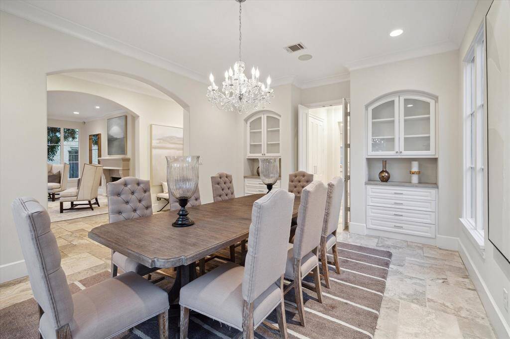 Another look at the formal dining room with lovely built-in display cabinetry.