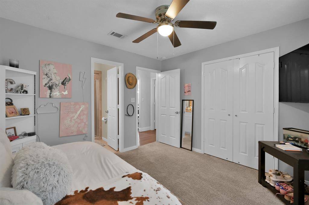 Inviting second bedroom with ample closet space.