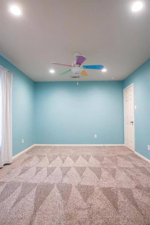 Second of the three LARGE bedrooms upstairs also with a HUGE walk-in closet.