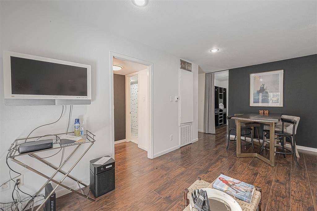 Gleaming laminate/wood flooring.