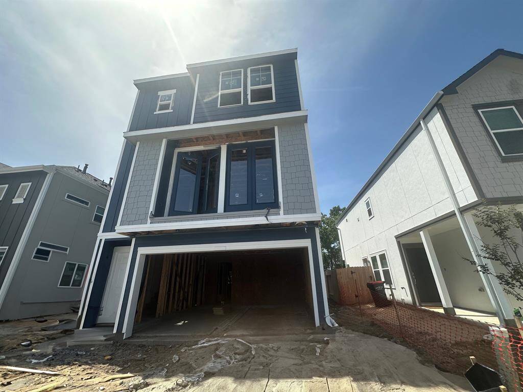 Three-story home with 3 bedrooms, 3.5 baths and 2 car garage