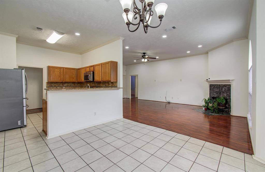 Kitchen, dining and living areas flow together so the chef never misses the conversation.