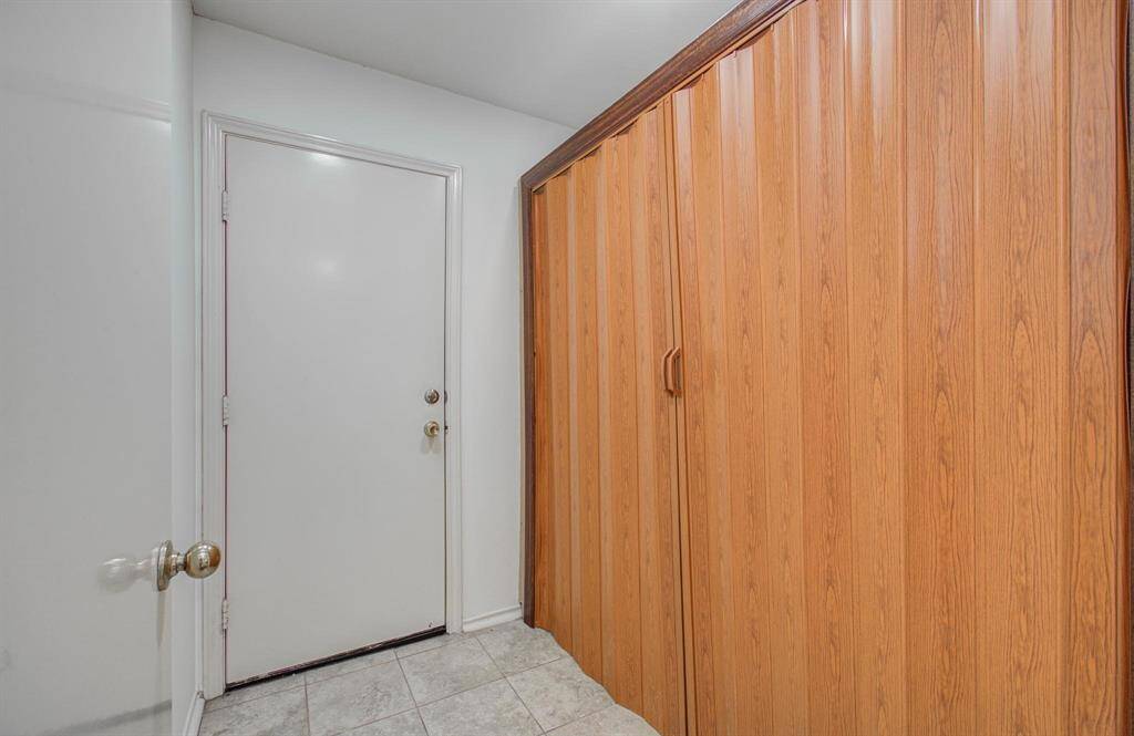 Mud-room entry – Tile flooring and built-in storage create a handy drop-zone between garage and living areas.